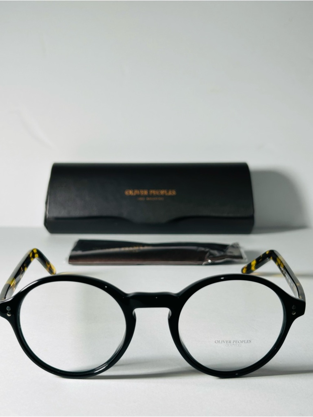 Oliver Peoples Black Fronts with Tortoise Temples Round Glasses